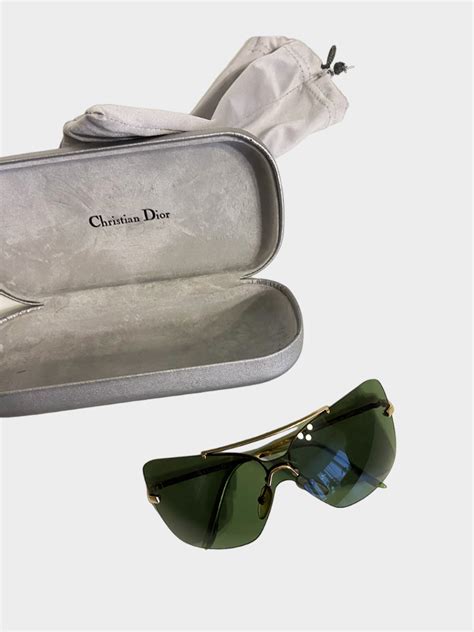 Christian Dior Mini Motard Rimless Sunglasses .